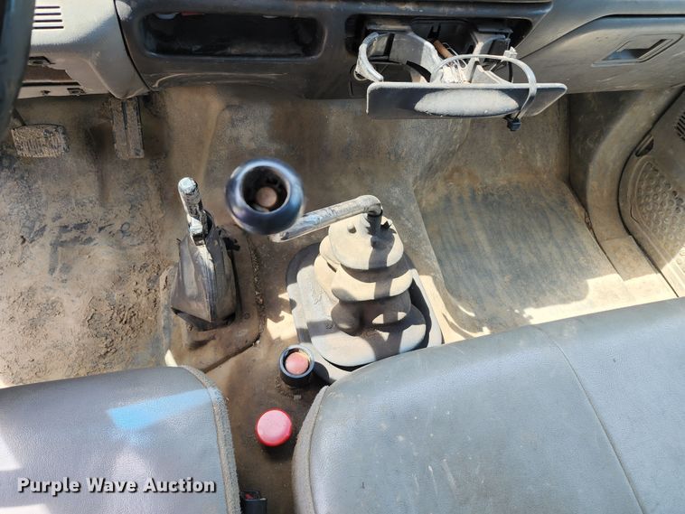 image for item JA9879 2004 Ford F650 Super Duty  dump flatbed truck