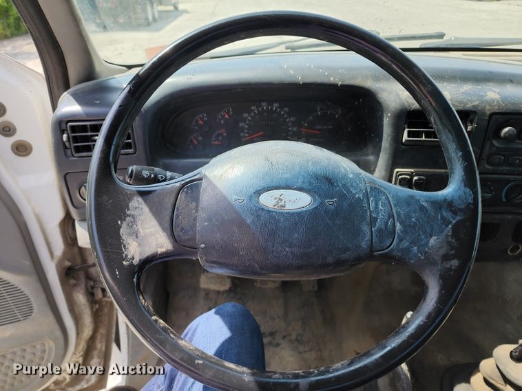 image for item JA9879 2004 Ford F650 Super Duty  dump flatbed truck