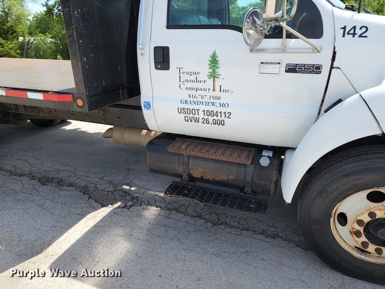 image for item JA9879 2004 Ford F650 Super Duty  dump flatbed truck