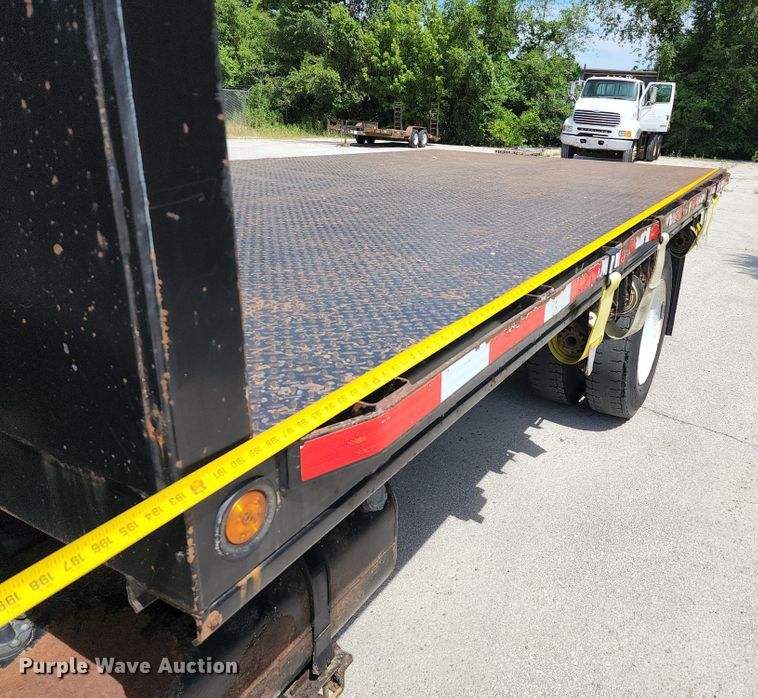 image for item JA9879 2004 Ford F650 Super Duty  dump flatbed truck