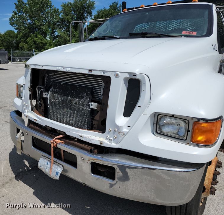 image for item JA9879 2004 Ford F650 Super Duty  dump flatbed truck