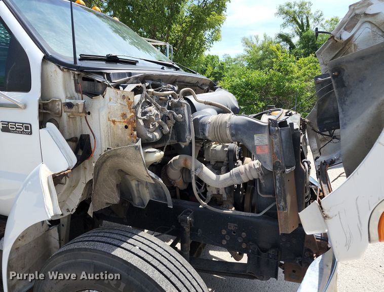 image for item JA9879 2004 Ford F650 Super Duty  dump flatbed truck