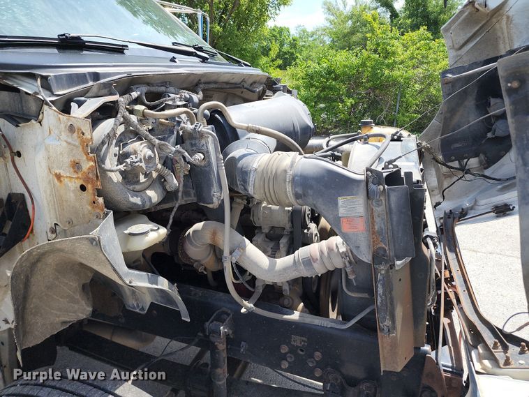 image for item JA9879 2004 Ford F650 Super Duty  dump flatbed truck