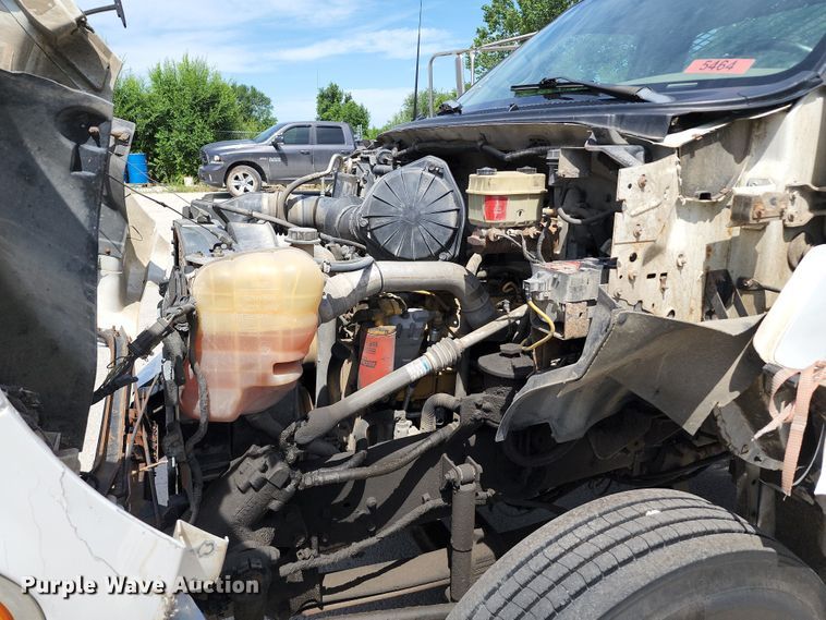 image for item JA9879 2004 Ford F650 Super Duty  dump flatbed truck