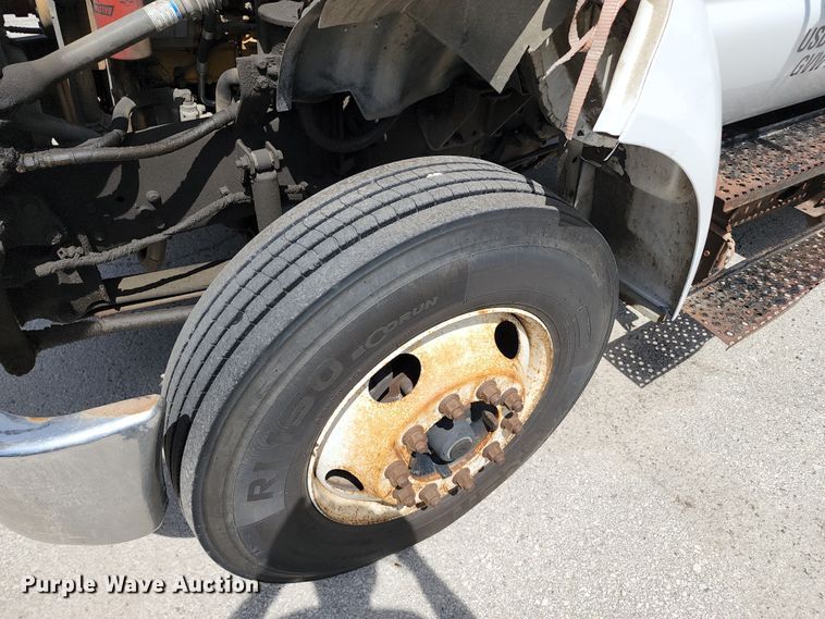 image for item JA9879 2004 Ford F650 Super Duty  dump flatbed truck