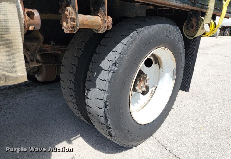 image for item JA9879 2004 Ford F650 Super Duty  dump flatbed truck