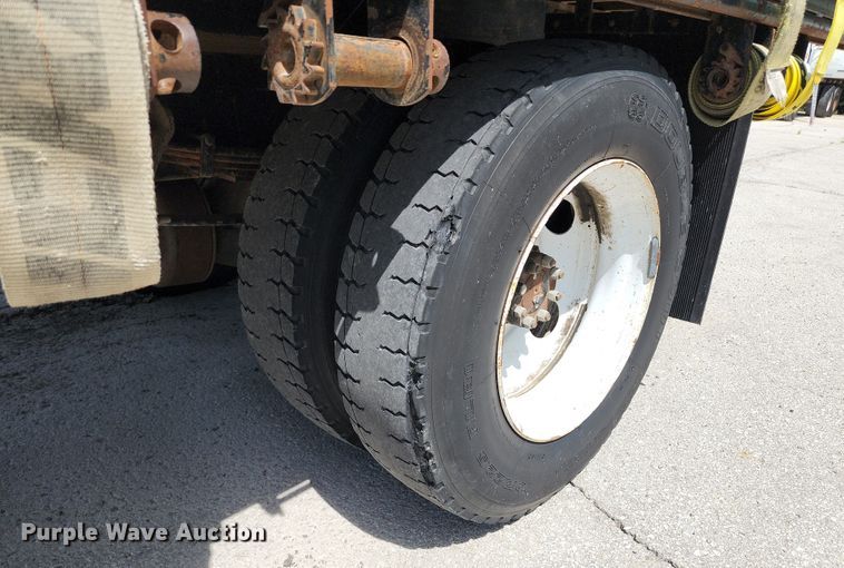 image for item JA9879 2004 Ford F650 Super Duty  dump flatbed truck