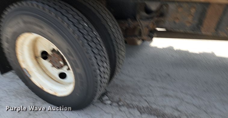 image for item JA9879 2004 Ford F650 Super Duty  dump flatbed truck