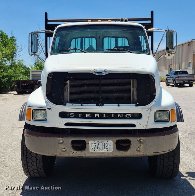 image for item JA9880 2004 Sterling L-Line  dump flatbed truck