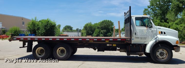 image for item JA9880 2004 Sterling L-Line  dump flatbed truck