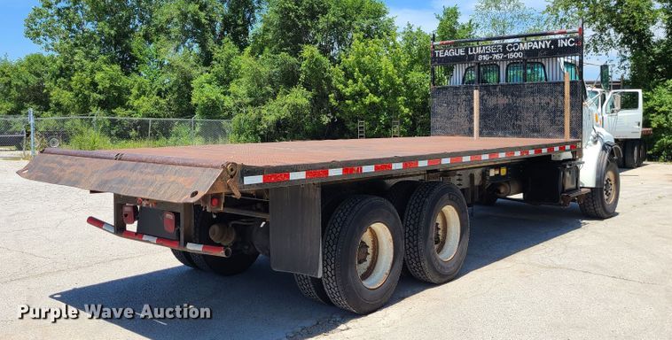 image for item JA9880 2004 Sterling L-Line  dump flatbed truck