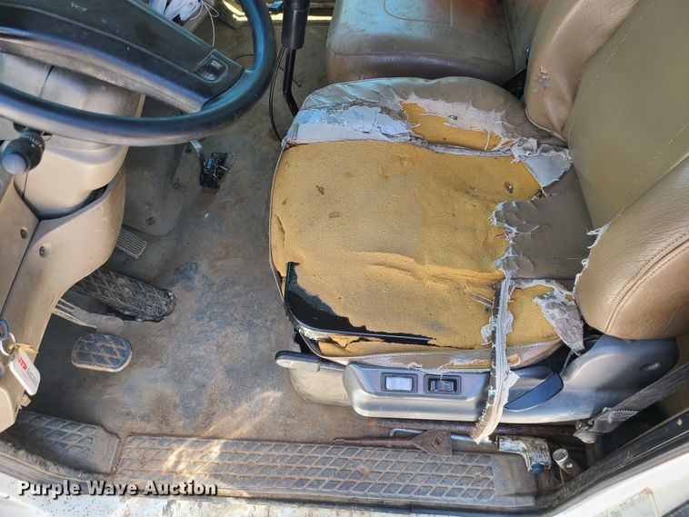 image for item JA9880 2004 Sterling L-Line  dump flatbed truck