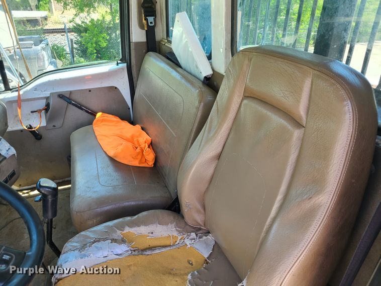 image for item JA9880 2004 Sterling L-Line  dump flatbed truck