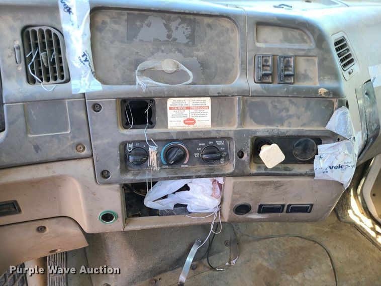 image for item JA9880 2004 Sterling L-Line  dump flatbed truck