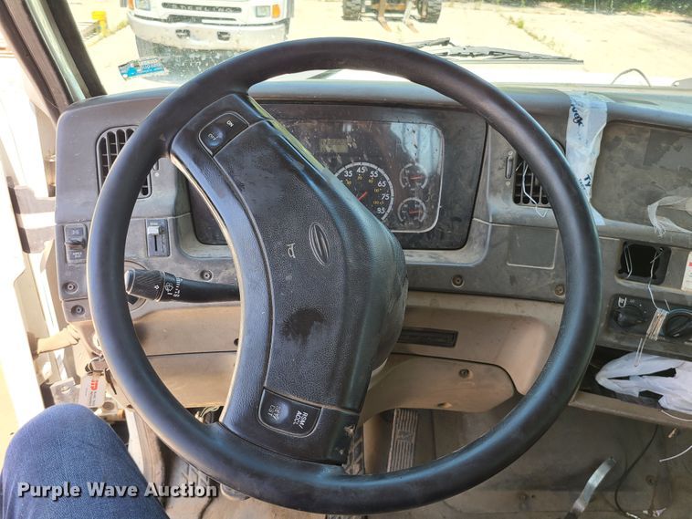 image for item JA9880 2004 Sterling L-Line  dump flatbed truck