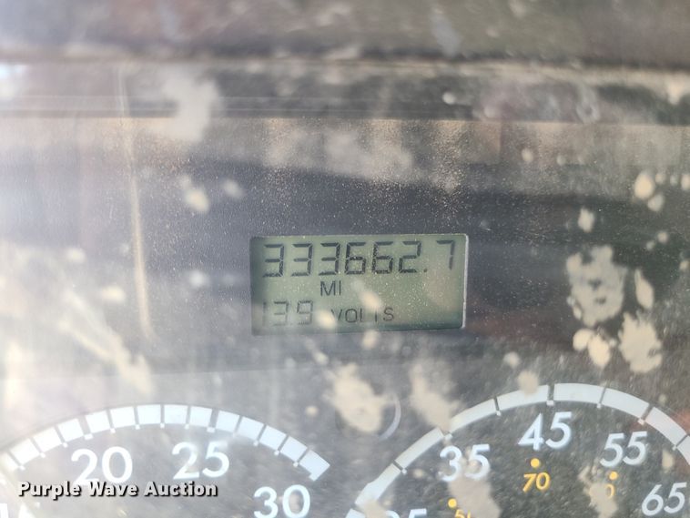 image for item JA9880 2004 Sterling L-Line  dump flatbed truck