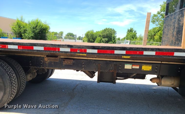 image for item JA9880 2004 Sterling L-Line  dump flatbed truck
