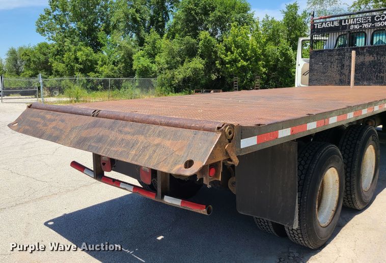 image for item JA9880 2004 Sterling L-Line  dump flatbed truck