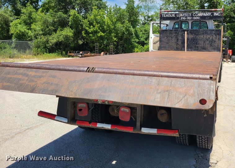 image for item JA9880 2004 Sterling L-Line  dump flatbed truck