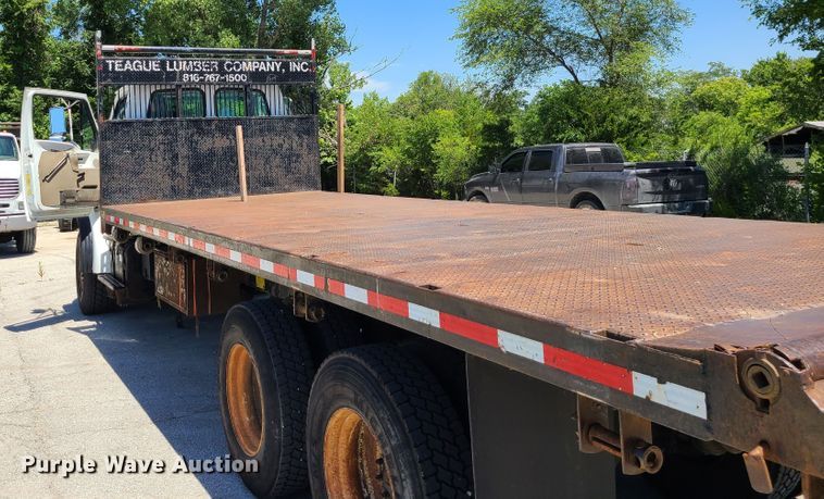 image for item JA9880 2004 Sterling L-Line  dump flatbed truck