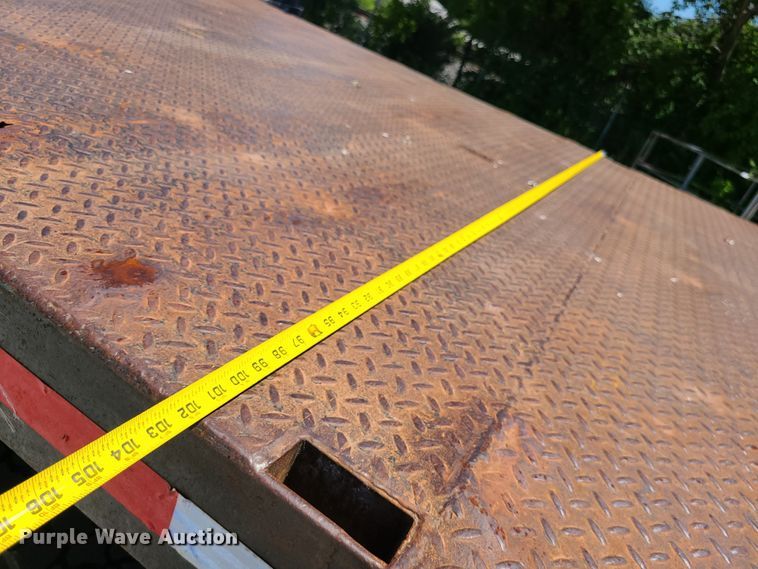 image for item JA9880 2004 Sterling L-Line  dump flatbed truck