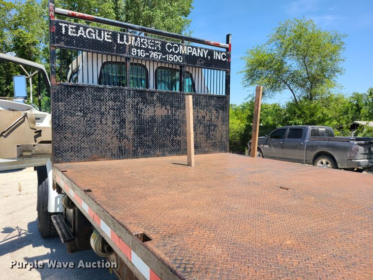 image for item JA9880 2004 Sterling L-Line  dump flatbed truck