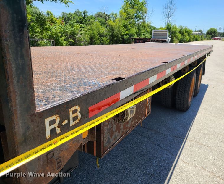 image for item JA9880 2004 Sterling L-Line  dump flatbed truck