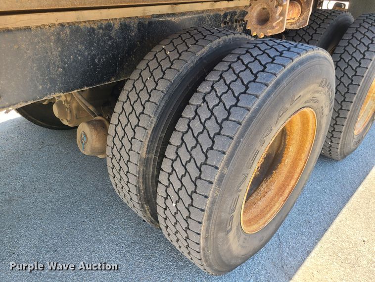 image for item JA9880 2004 Sterling L-Line  dump flatbed truck