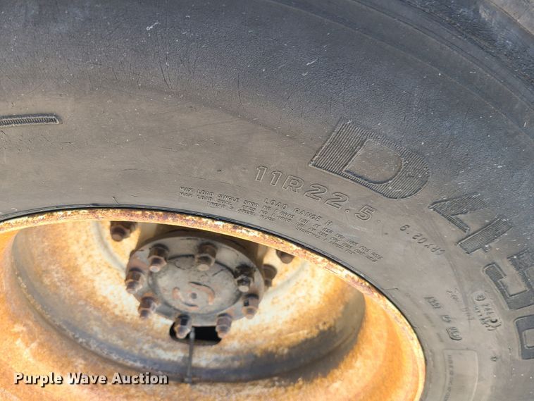 image for item JA9880 2004 Sterling L-Line  dump flatbed truck