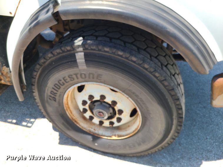 image for item JA9880 2004 Sterling L-Line  dump flatbed truck