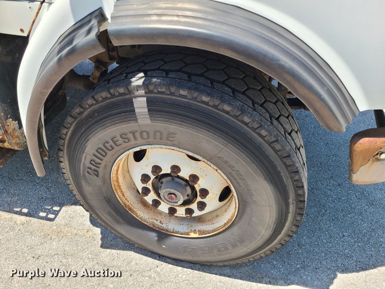 image for item JA9880 2004 Sterling L-Line  dump flatbed truck