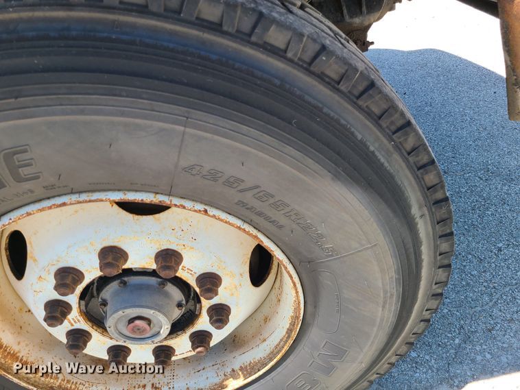 image for item JA9880 2004 Sterling L-Line  dump flatbed truck