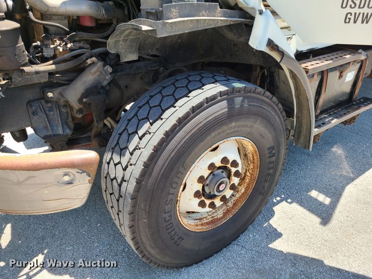 image for item JA9880 2004 Sterling L-Line  dump flatbed truck