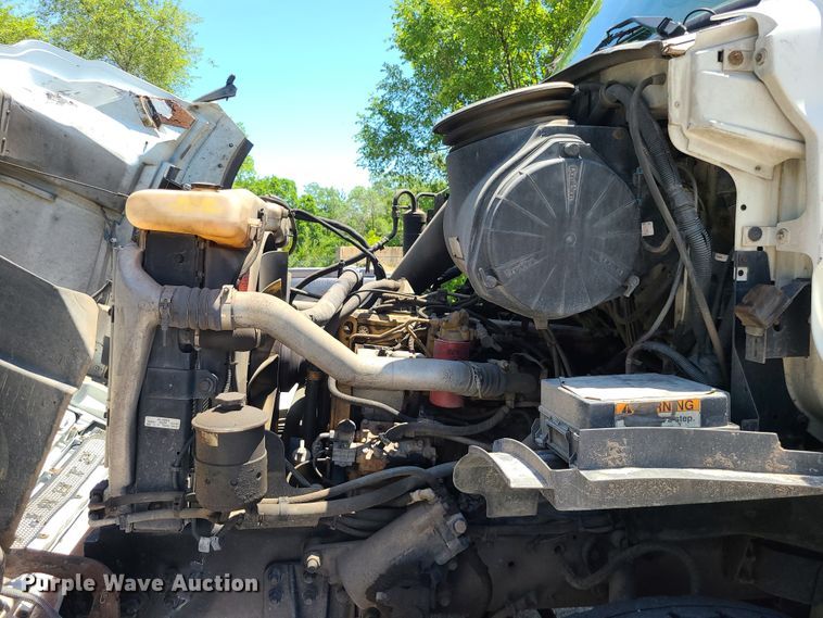 image for item JA9880 2004 Sterling L-Line  dump flatbed truck