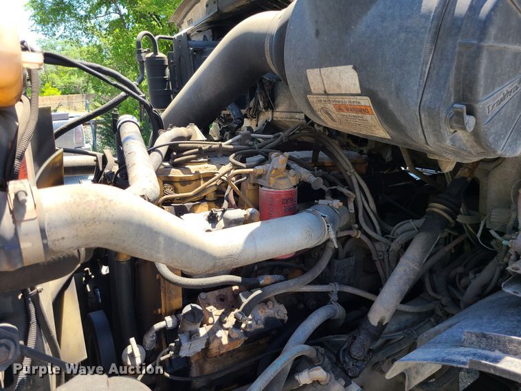 image for item JA9880 2004 Sterling L-Line  dump flatbed truck