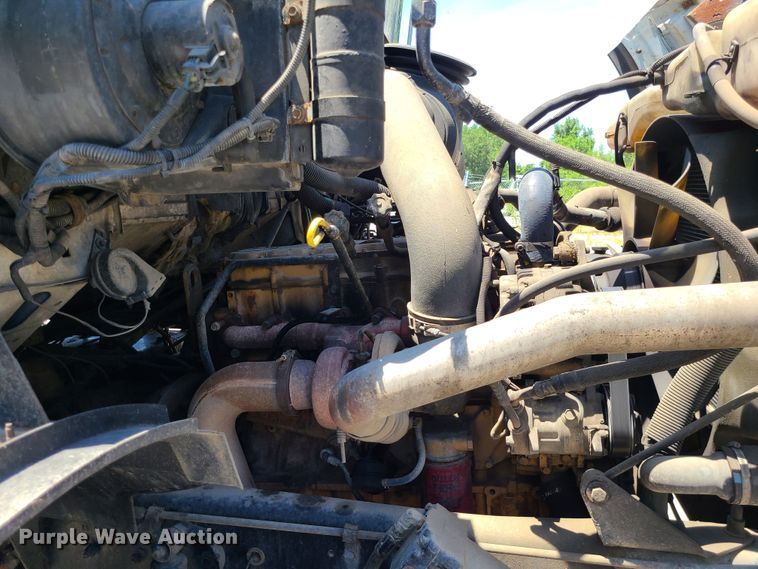 image for item JA9880 2004 Sterling L-Line  dump flatbed truck