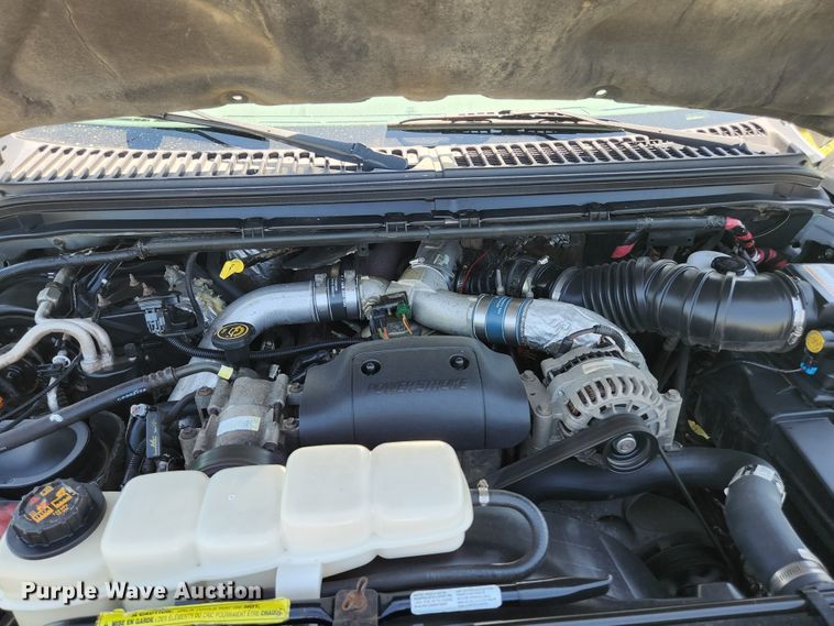 image for item JM9006 2002 Ford F250 Super Duty XLT  SuperCab flatbed pickup truck