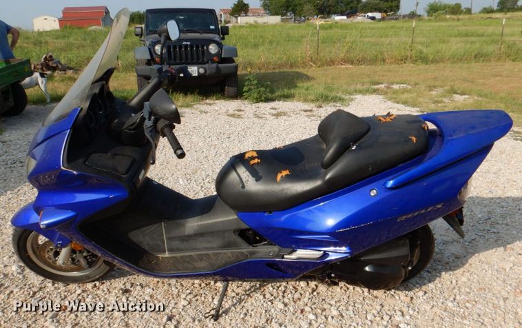 image for item MK9587 2006 Honda Reflex  scooter