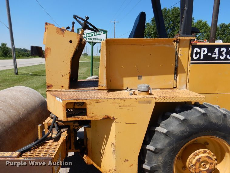image for item JO9047 1994 Caterpillar CP-433B  single drum vibratory roller