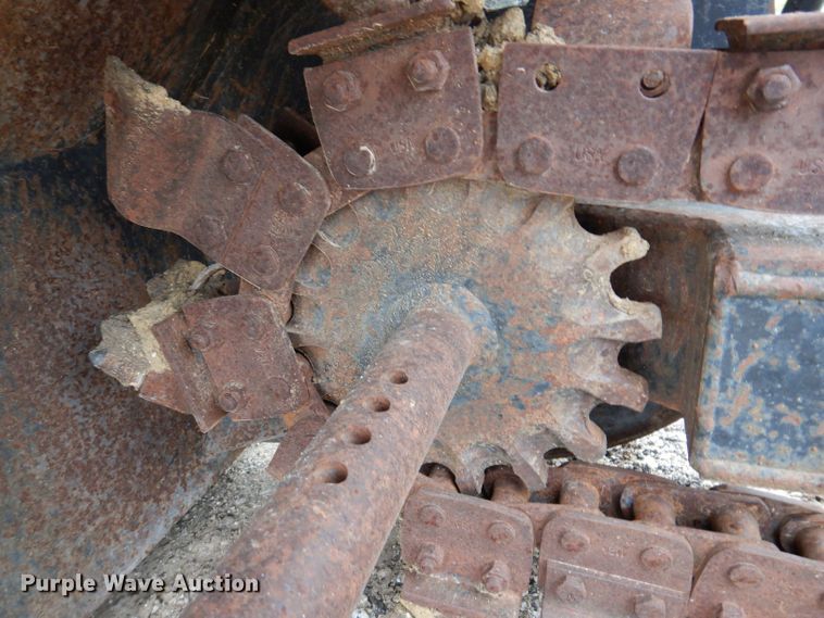 image for item JO9053 Lowe 30CS  skid steer trencher