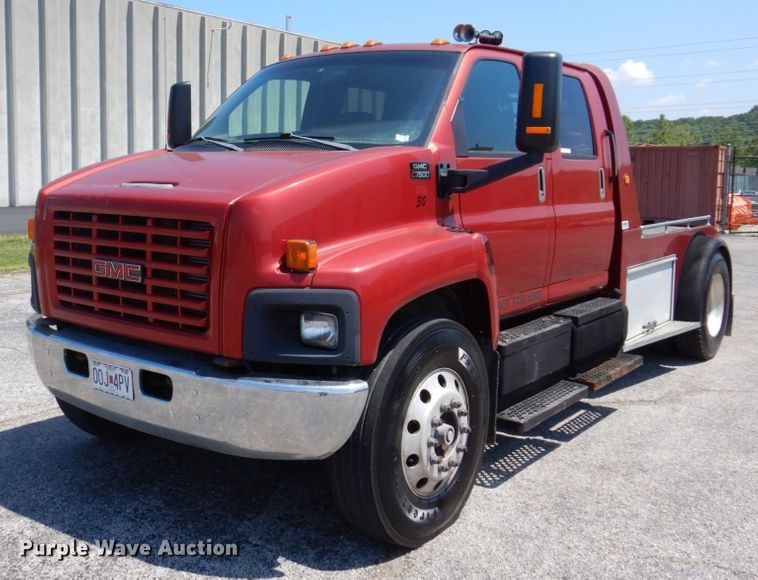 image for item KF9690 2005 GMC C7500  Crew Cab flatbed truck