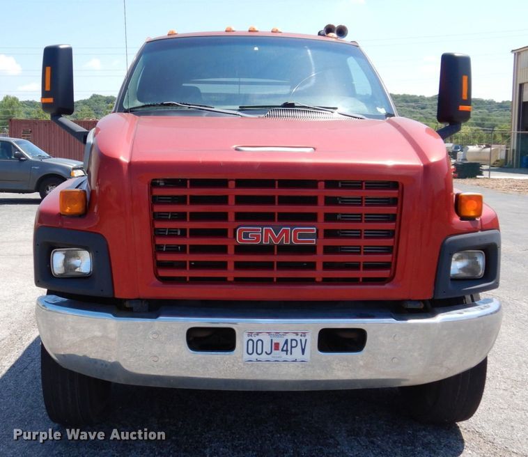 image for item KF9690 2005 GMC C7500  Crew Cab flatbed truck