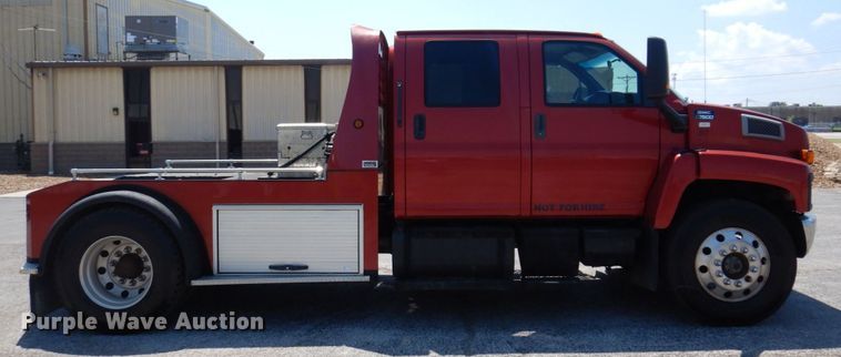 image for item KF9690 2005 GMC C7500  Crew Cab flatbed truck