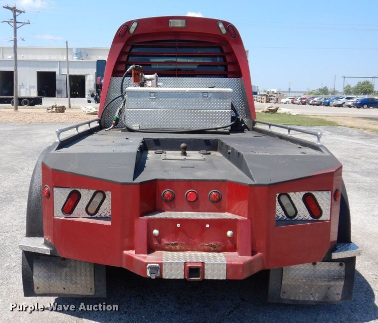 image for item KF9690 2005 GMC C7500  Crew Cab flatbed truck