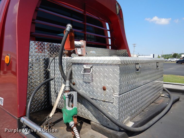 image for item KF9690 2005 GMC C7500  Crew Cab flatbed truck