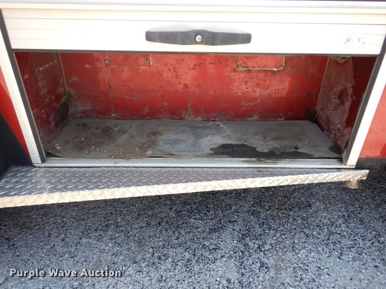 image for item KF9690 2005 GMC C7500  Crew Cab flatbed truck