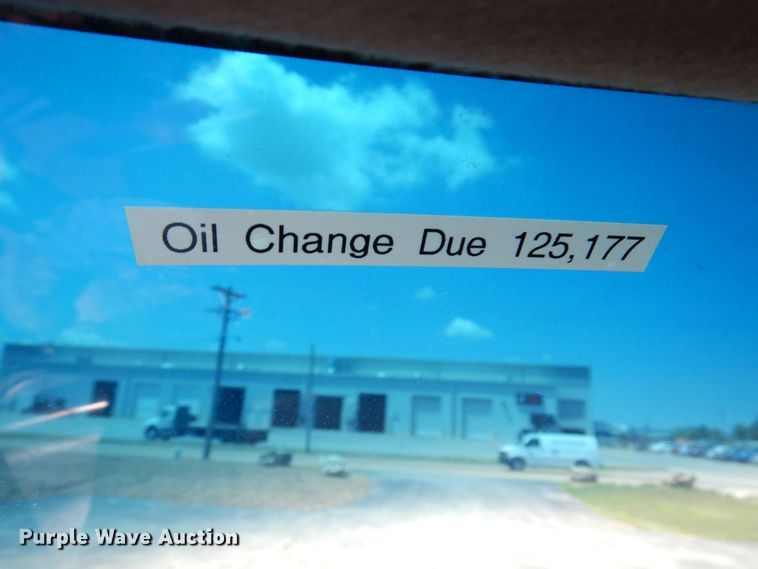 image for item KF9690 2005 GMC C7500  Crew Cab flatbed truck