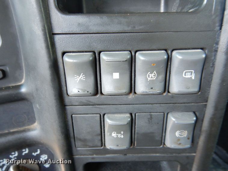 image for item KF9690 2005 GMC C7500  Crew Cab flatbed truck