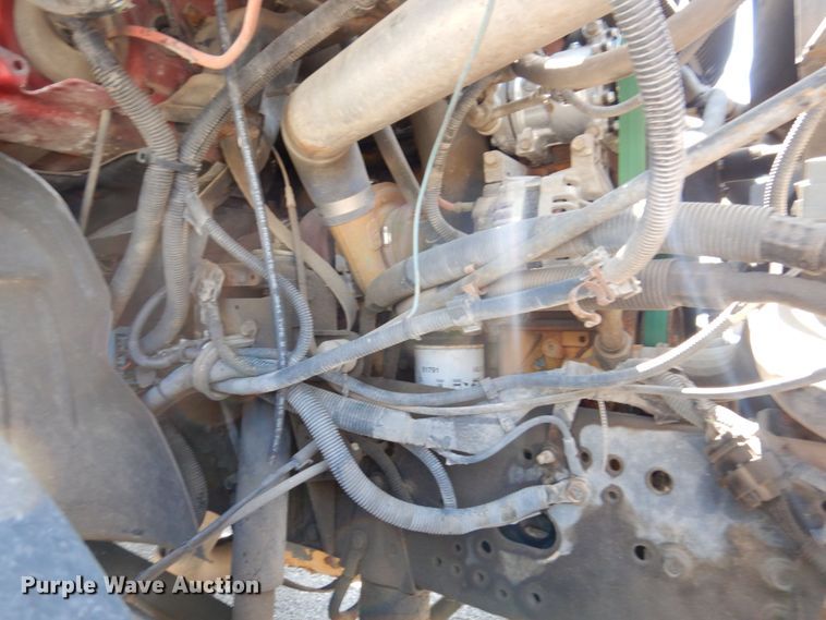 image for item KF9690 2005 GMC C7500  Crew Cab flatbed truck