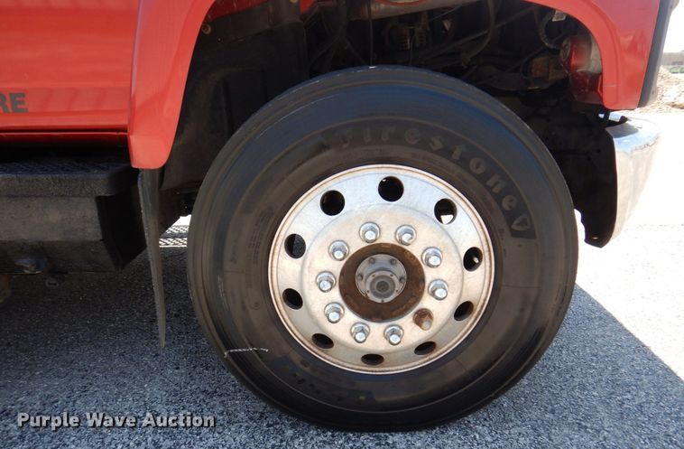 image for item KF9690 2005 GMC C7500  Crew Cab flatbed truck